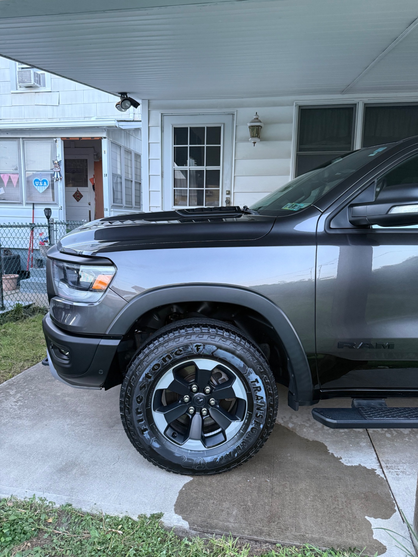 Ram pickup driver-side front wheel and fender after detail