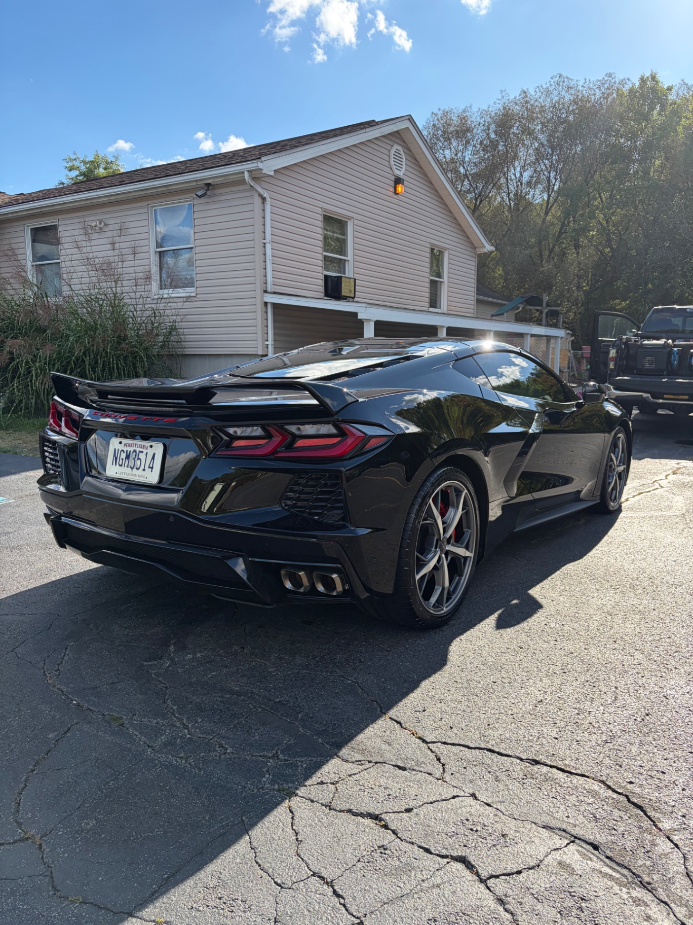 Black Chevrolet Corvette C8 rear three-quarter after ceramic coating
