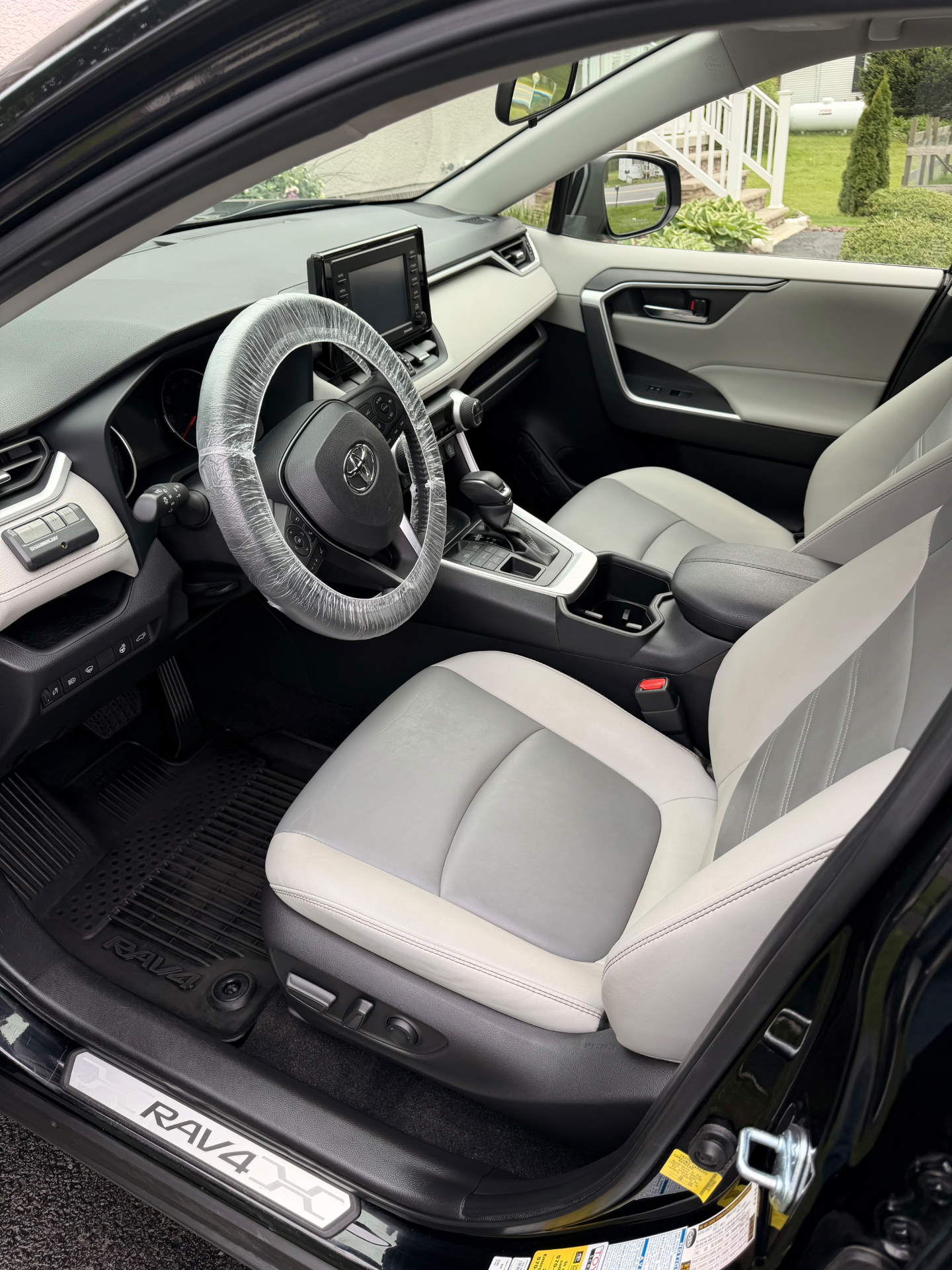 Toyota RAV4 driver-side two-tone interior after full detail